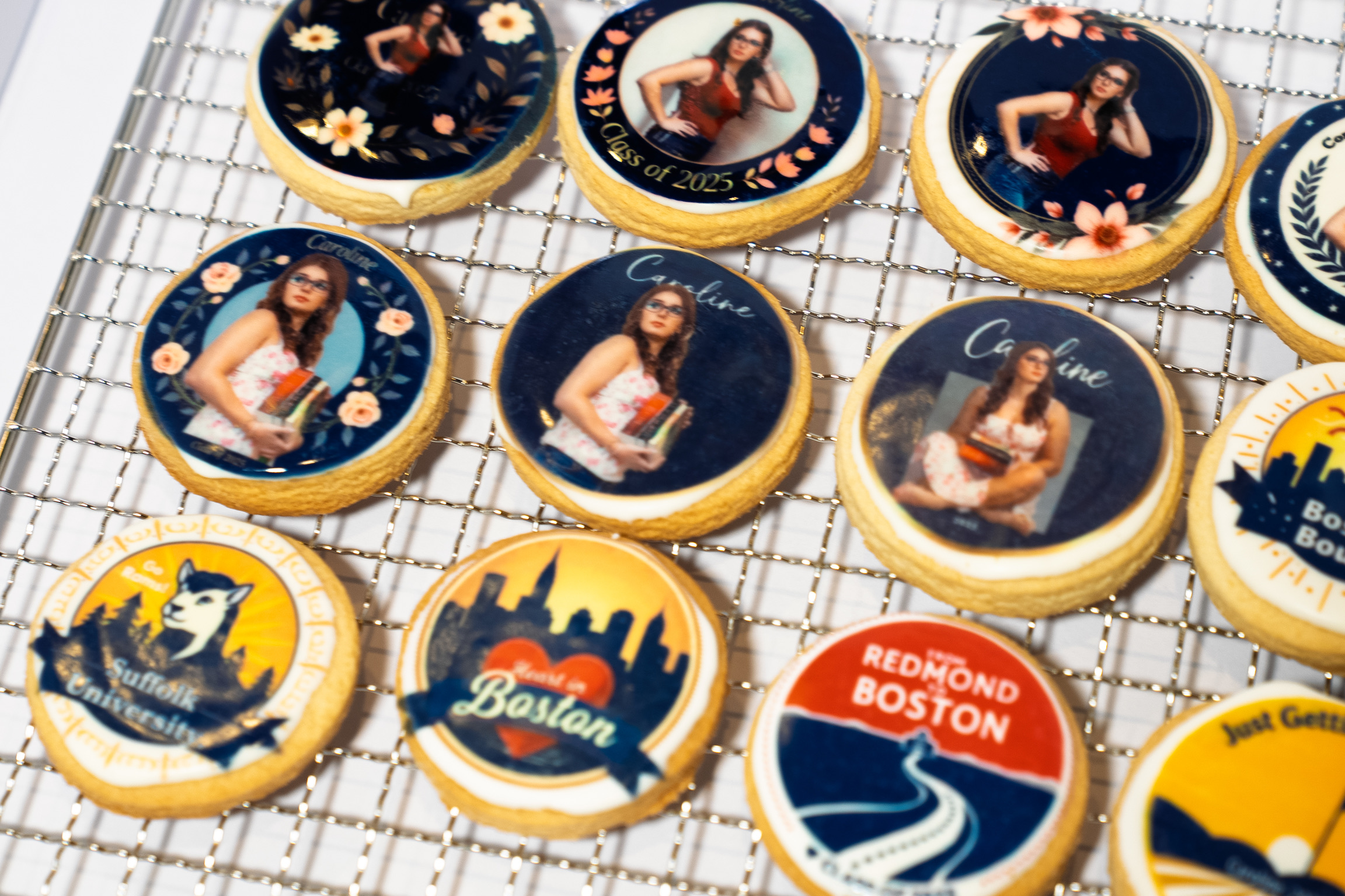 Custom graduation cookies displayed on a cooling rack